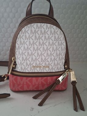 Michael Kors Rhea Mini Convertible Backpack Crossbody Vanilla Pink-Coral Brown